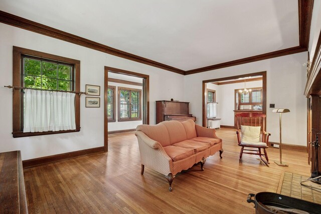 73 Arthur Ave SE, Minneapolis, MN 55414 - bedroom with a chandelier, light wood-style flooring, and ornamental molding