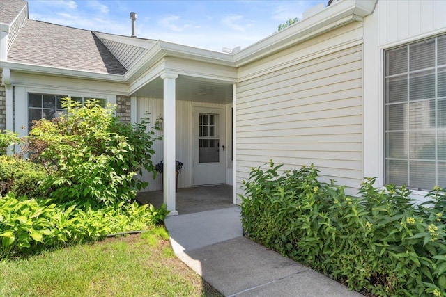 7514 Ojibway Park Rd, Woodbury, MN 55125 - entrance to property featuring covered porch and roof with shingles