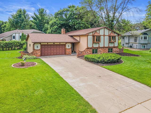 7401 River Shore Ln, Champlin, MN 55316 - view of front of house with brick siding, a chimney, concrete driveway, a garage, and a front lawn