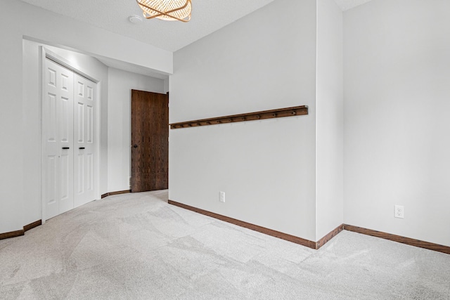 7401 River Shore Ln, Champlin, MN 55316 - unfurnished bedroom featuring carpet and a closet