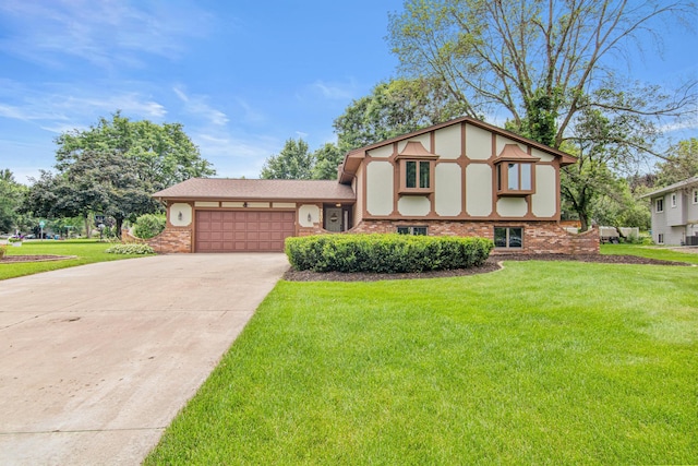 7401 River Shore Ln, Champlin, MN 55316 - view of front of property featuring an attached garage, driveway, a front yard, and brick siding