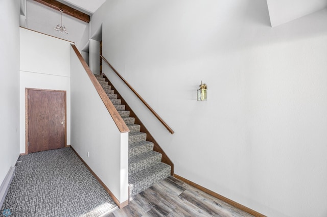 3237 17th Ave S Unit 101, Fargo, ND 58103 - stairs featuring wood finished floors and beamed ceiling