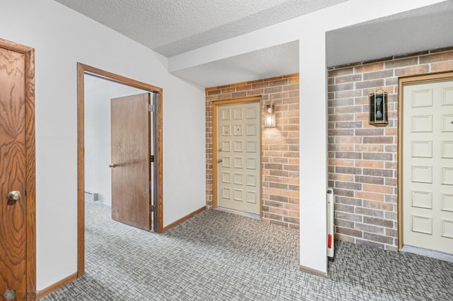 3237 17th Ave S Unit 101, Fargo, ND 58103 - basement with carpet floors and a textured ceiling