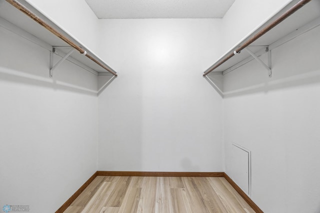 3237 17th Ave S Unit 101, Fargo, ND 58103 - spacious closet featuring wood finished floors