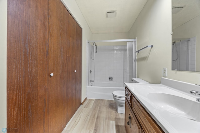 3237 17th Ave S Unit 101, Fargo, ND 58103 - bathroom with vanity, wood finished floors, and bathtub / shower combination