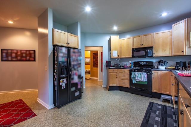15212 667th St, Wabasha, MN 55981 - kitchen featuring black appliances, dark countertops, recessed lighting, and light brown cabinetry
