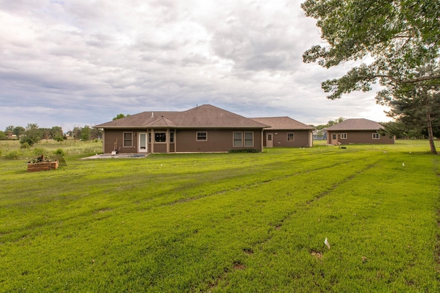 15212 667th St, Wabasha, MN 55981 - rear view of property featuring a patio area and a yard