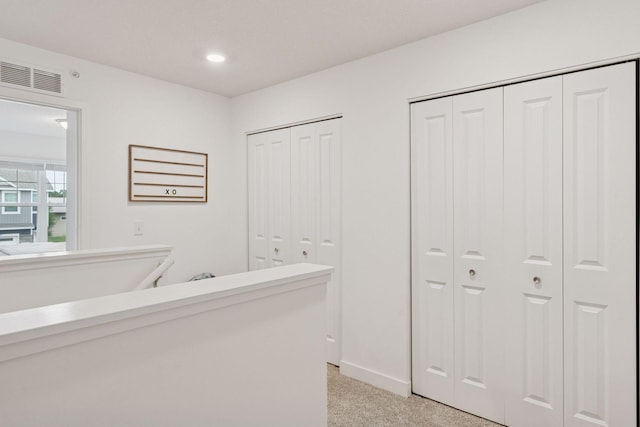 11121 Balsam Pointe Trl, Dayton, MN 55327 - hall with light carpet and recessed lighting