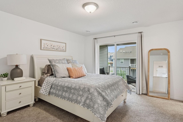 11121 Balsam Pointe Trl, Dayton, MN 55327 - bedroom with carpet, access to exterior, and a textured ceiling