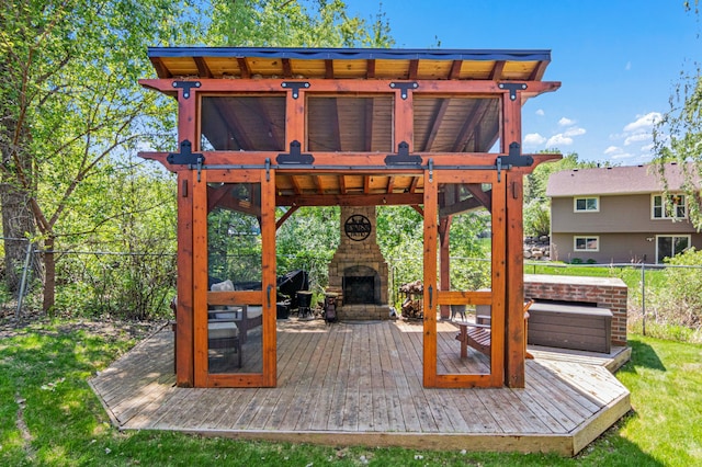1962 72 1/2 St, Centerville, MN 55038 - wooden terrace with an outdoor stone fireplace