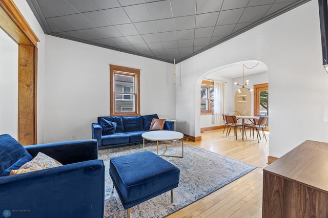 726 Oak St N, Fargo, ND 58102 - living room with arched walkways and hardwood / wood-style flooring