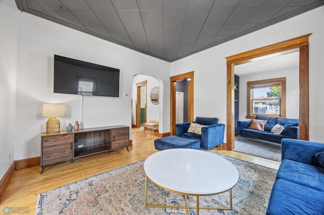 726 Oak St N, Fargo, ND 58102 - living area with arched walkways and wood finished floors