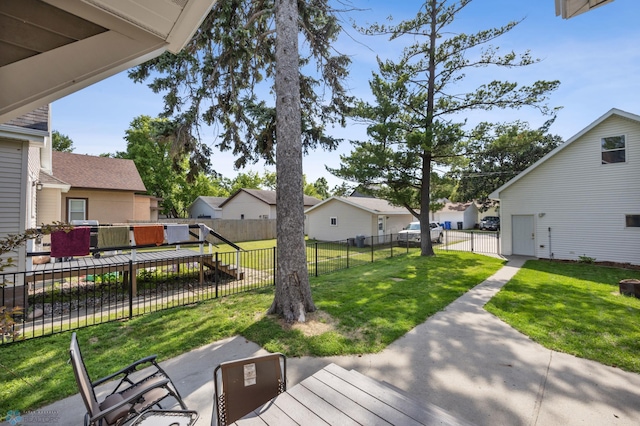 726 Oak St N, Fargo, ND 58102 - fenced backyard with a residential view and a wooden deck