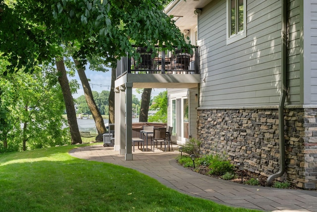 4832 Longford Rd, Mound, MN 55364 - view of grassy yard with a balcony and a patio
