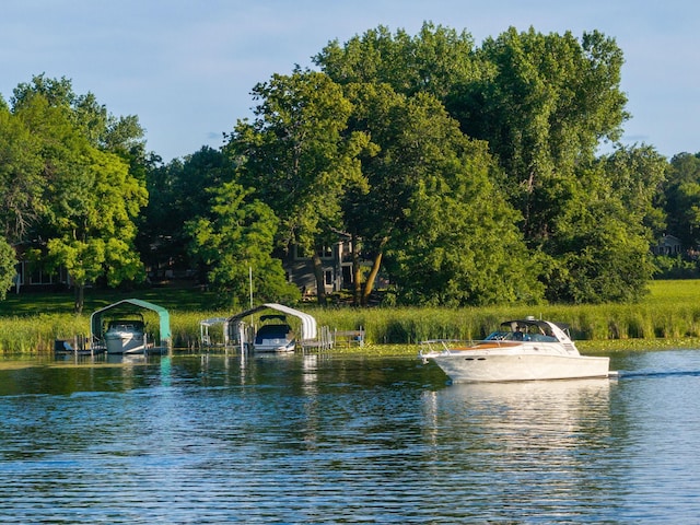 4832 Longford Rd, Mound, MN 55364 - water view featuring a dock and boat lift