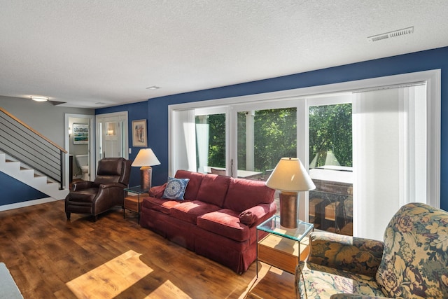 4832 Longford Rd, Mound, MN 55364 - living room featuring plenty of natural light, stairway, wood finished floors, and a textured ceiling