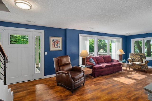 4832 Longford Rd, Mound, MN 55364 - living area with a textured ceiling and wood finished floors