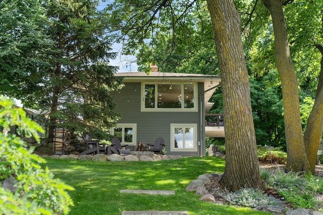 4832 Longford Rd, Mound, MN 55364 - rear view of property with a yard, a chimney, and a patio