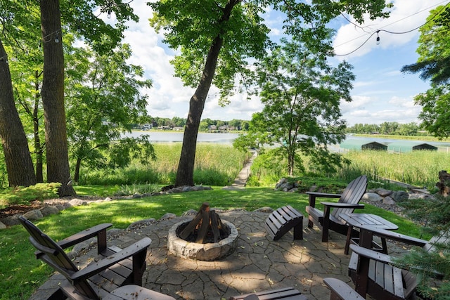 4832 Longford Rd, Mound, MN 55364 - view of patio with a fire pit and a water view