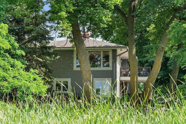 4832 Longford Rd, Mound, MN 55364 - view of side of home featuring a chimney
