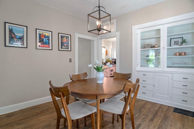 823 Owens St N, Stillwater, MN 55082 - dining area featuring a chandelier and dark wood-style floors