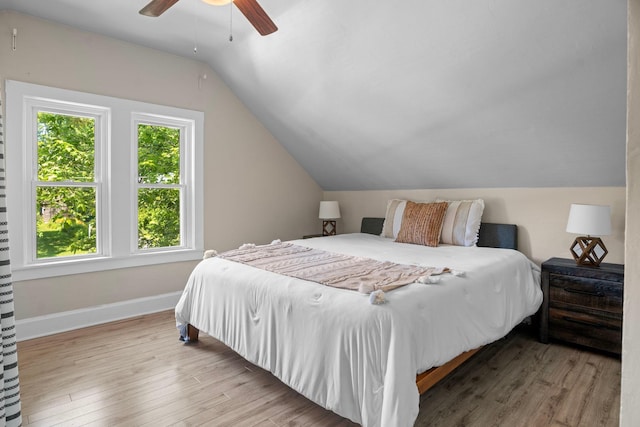 823 Owens St N, Stillwater, MN 55082 - bedroom featuring vaulted ceiling, wood finished floors, and a ceiling fan