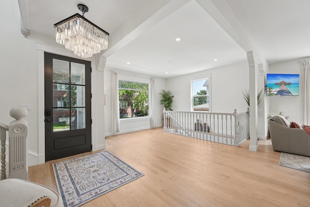 109 Pine St E, Stillwater, MN 55082 - entrance foyer with wood finished floors, a chandelier, and recessed lighting