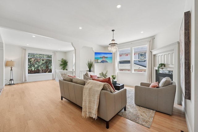 109 Pine St E, Stillwater, MN 55082 - living area with light wood-type flooring, recessed lighting, and a chandelier