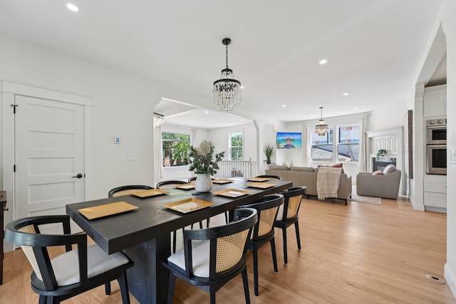 109 Pine St E, Stillwater, MN 55082 - dining area featuring light wood-type flooring, recessed lighting, and a chandelier