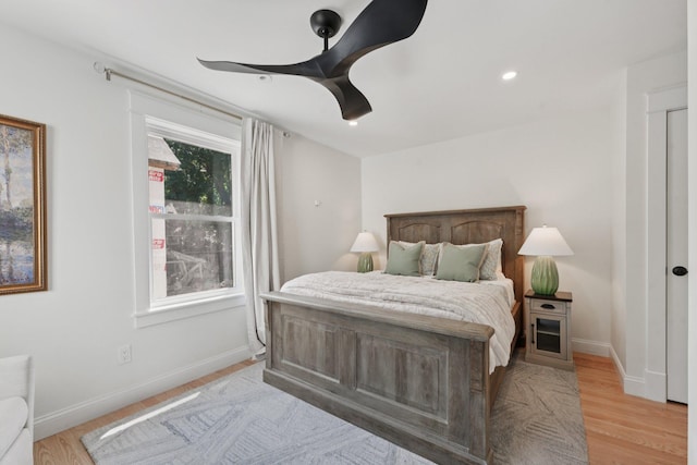 109 Pine St E, Stillwater, MN 55082 - bedroom with light wood-style flooring and ceiling fan