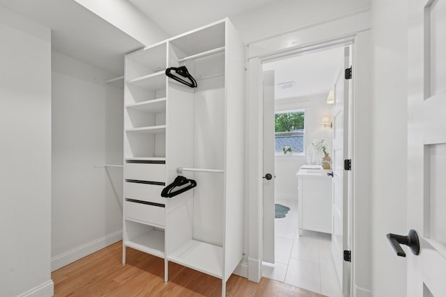 109 Pine St E, Stillwater, MN 55082 - walk in closet with light wood-style floors
