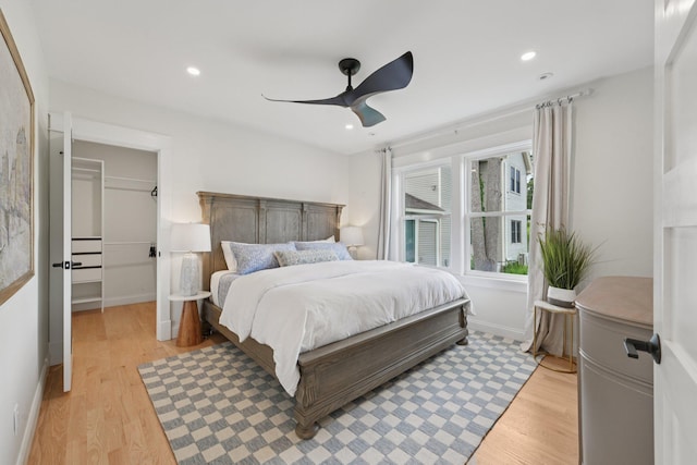 109 Pine St E, Stillwater, MN 55082 - bedroom with light wood-style flooring, a ceiling fan, and recessed lighting