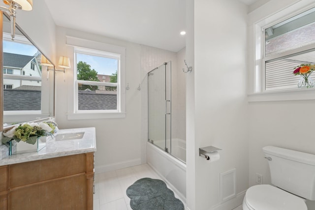109 Pine St E, Stillwater, MN 55082 - bathroom featuring vanity, combined bath / shower with glass door, tile patterned flooring, and recessed lighting