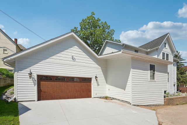 109 Pine St E, Stillwater, MN 55082 - view of front facade featuring a garage and driveway