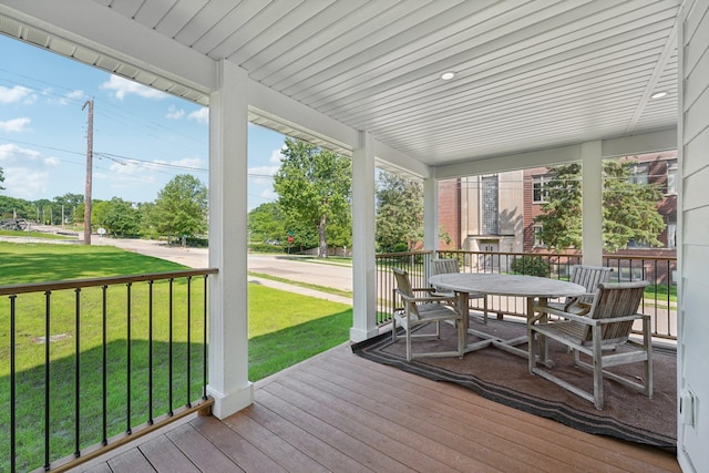 109 Pine St E, Stillwater, MN 55082 - wooden porch with a lawn and outdoor dining area