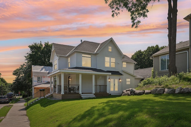 109 Pine St E, Stillwater, MN 55082 - view of front of house with a shingled roof, covered porch, and a front yard