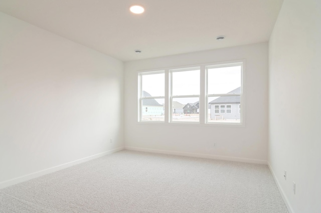 14516 111th Ave E, Dayton, MN 55369 - spare room featuring light carpet and recessed lighting