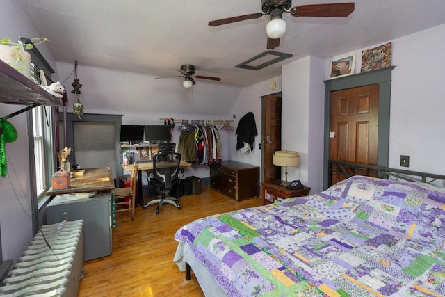 2912 15th Ave S, Minneapolis, MN 55407 - bedroom with a desk, wood finished floors, lofted ceiling, and a ceiling fan