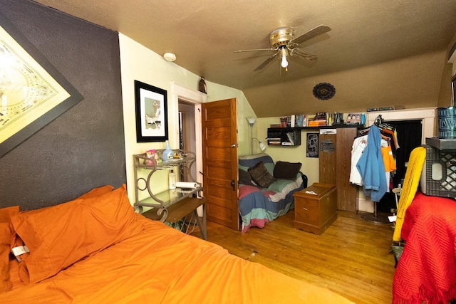 2912 15th Ave S, Minneapolis, MN 55407 - bedroom featuring wood finished floors, vaulted ceiling, and ceiling fan