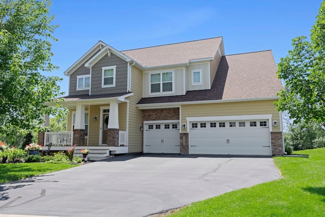 18837 Javelin Way, Lakeville, MN 55044 - craftsman house with driveway, a porch, stone siding, a front lawn, and roof with shingles