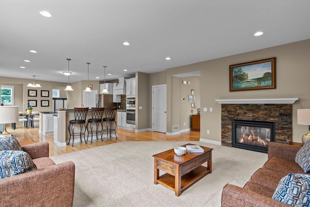 18837 Javelin Way, Lakeville, MN 55044 - living area featuring recessed lighting, a fireplace, and light wood finished floors
