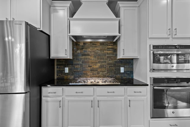 18837 Javelin Way, Lakeville, MN 55044 - kitchen featuring appliances with stainless steel finishes, custom exhaust hood, white cabinetry, and tasteful backsplash