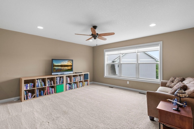 18837 Javelin Way, Lakeville, MN 55044 - carpeted living area with ceiling fan and recessed lighting