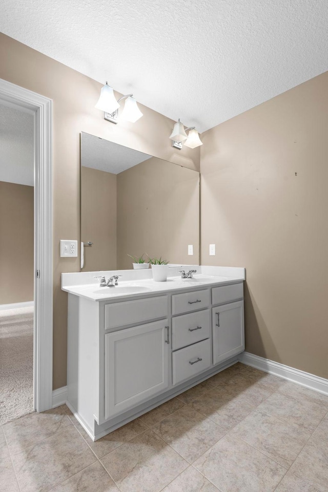 18837 Javelin Way, Lakeville, MN 55044 - full bathroom with double vanity, a textured ceiling, and tile patterned floors