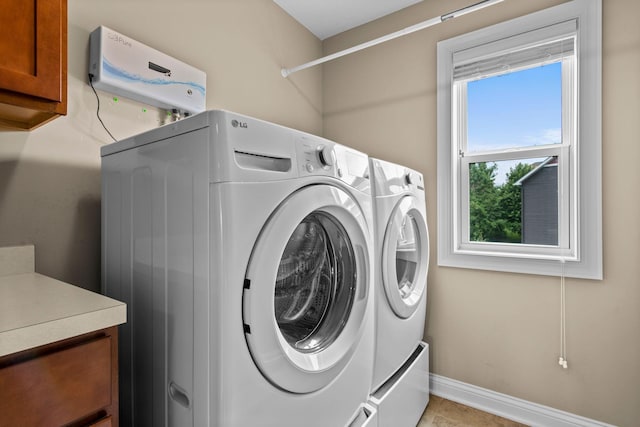 18837 Javelin Way, Lakeville, MN 55044 - washroom with washer and clothes dryer and cabinet space