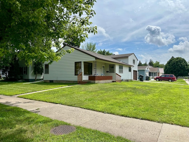 1224 Duba St, Worthington, MN 56187 - view of front facade featuring covered porch, a front lawn, and crawl space