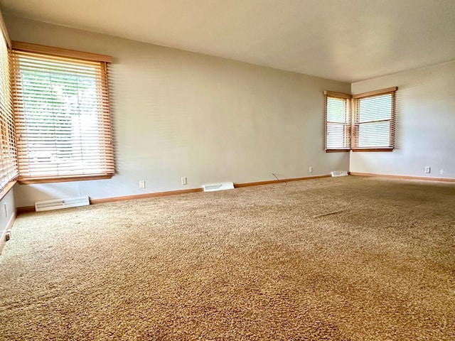 1224 Duba St, Worthington, MN 56187 - unfurnished room with carpet and baseboards