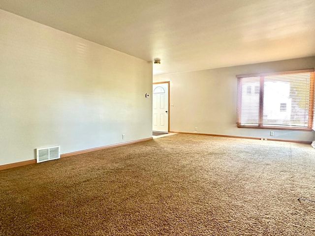 1224 Duba St, Worthington, MN 56187 - unfurnished room with carpet floors