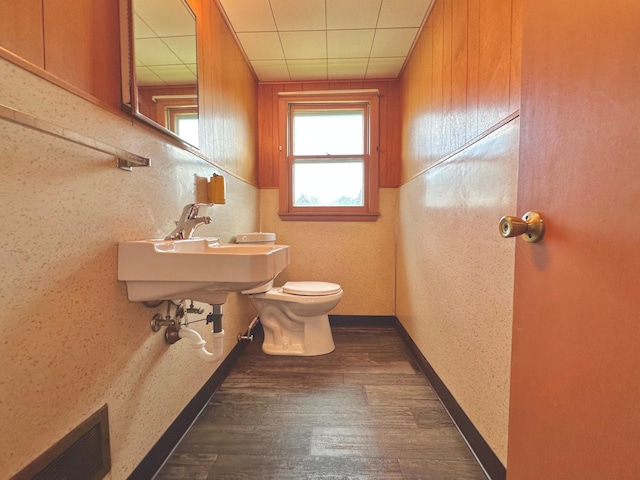 1224 Duba St, Worthington, MN 56187 - half bathroom with toilet and wood finished floors