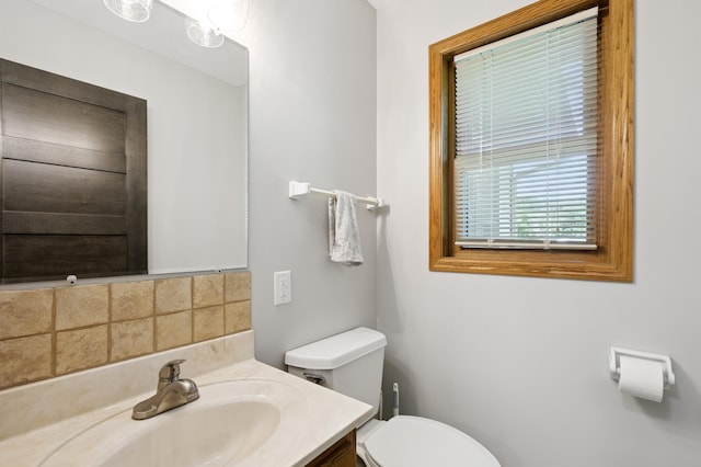 22470 Raven St NW, Oak Grove, MN 55011 - half bathroom featuring toilet and vanity